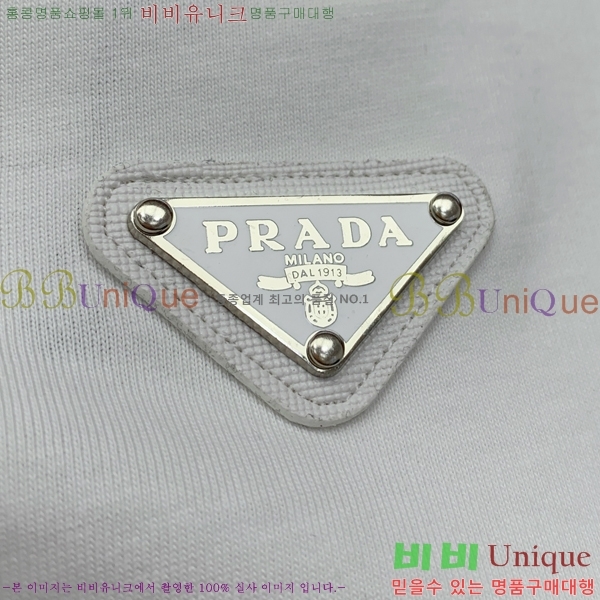    Ƽ P87977-1